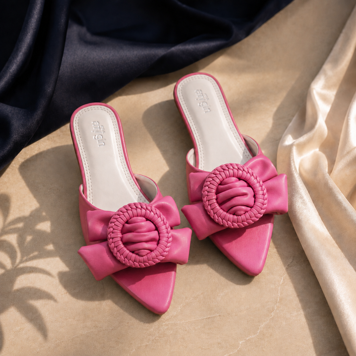 Pink slippers by Annish Footwear
